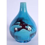 AN EARLY 20TH CENTURY JAPANESE MEIJI PERIOD TURQUOISE GLAZED VASE with purple splash. 17 cm x 10 cm.