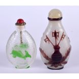 TWO EARLY 20TH CENTURY CHINESE PEKING GLASS SNUFF BOTTLES Late Qing/Republic. Largest 7.75 cm x 3.25