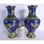 A PAIR OF EARLY 20TH CENTURY CHINESE CLOISONNE ENAMEL VASES Late Qing/Republic, decorated with drago