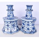 A pair of Chinese porcelain octagonal sided blue and white vases decorated with foliage and flower 2