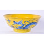 A Chinese porcelain Imperial yellow bowl decorated with a dragon . 8 x 18.5 cm..