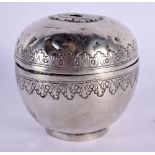 A 19TH CENTURY MIDDLE EASTERN SILVER STRING HOLDER decorated with motifs. 72 grams. 7.5 cm x 6.5 cm.