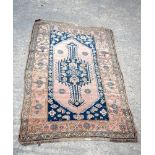 A small Turkish rug 167 x 107 cm.