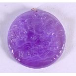 A CHINESE CARVED LAVENDER JADE PENDANT 20th Century. 4.5 cm wide.