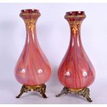 A PAIR OF FINE EARLY 20TH CENTURY FRENCH MOTTLED GLASS VASES with gilt metal mask head mounts. 24.5