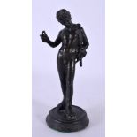 A 19TH CENTURY EUROPEAN GRAND TOUR FIGURE OF A MALE modelled upon a circular base. 14 cm high.