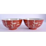 A PAIR OF CHINESE CORAL GROUND PORCELAIN BOWLS 20th Century. 11.5 cm diameter.
