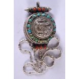 A SOUTH EAST ASIAN STYLE SILVER, TURQUOISE AND CORAL PENDANT. Stamped 925, chain 45cm, pendant 6.2