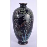 A LATE 19TH CENTURY JAPANESE MEIJI PERIOD CLOISONNE ENAMEL VASE decorated with foliage. 16 cm high.
