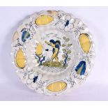 A VERY RARE 17TH CENTURY DELFT TIN GLAZED SCALLOPED BOWL painted with a winged figure within a lands