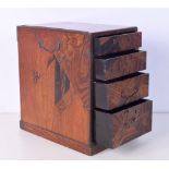 A small part section of wooden parquetry set of drawers 28 x 18 x 25 cm