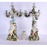 A LARGE PAIR OF 19TH CENTURY DRESDEN PORCELAIN CANDLESTICKS. 48 cm x 18 cm.