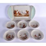A RARE EARLY 20TH CENTURY EUROPEAN PORCELAIN POLAR BEAR HUNT SERVING BOWL with six matching saucers.