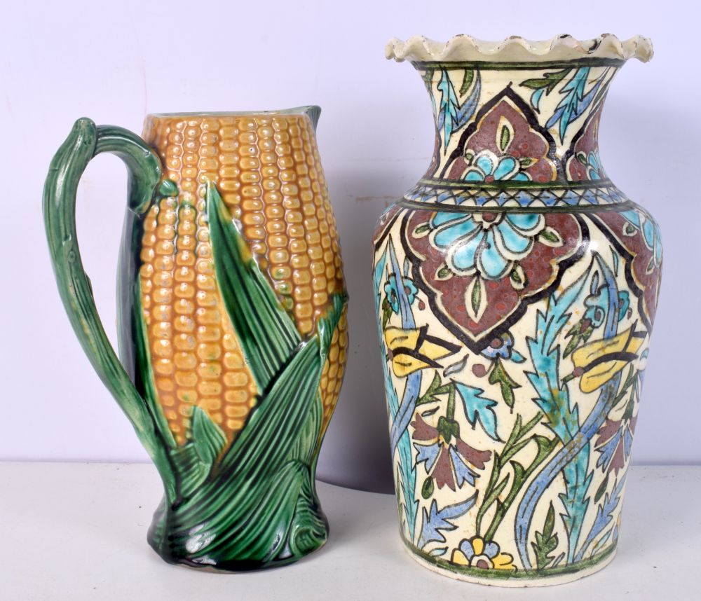 A TURKISH MIDDLE EASTERN IZNIK TYPE VASE and a majolica corn jug. Largest 26.5 cm high. (2) - Image 2 of 4