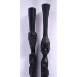 TWO AFRICAN TRIBAL EBONY WALKING STICKS. 85 cm long. (2)