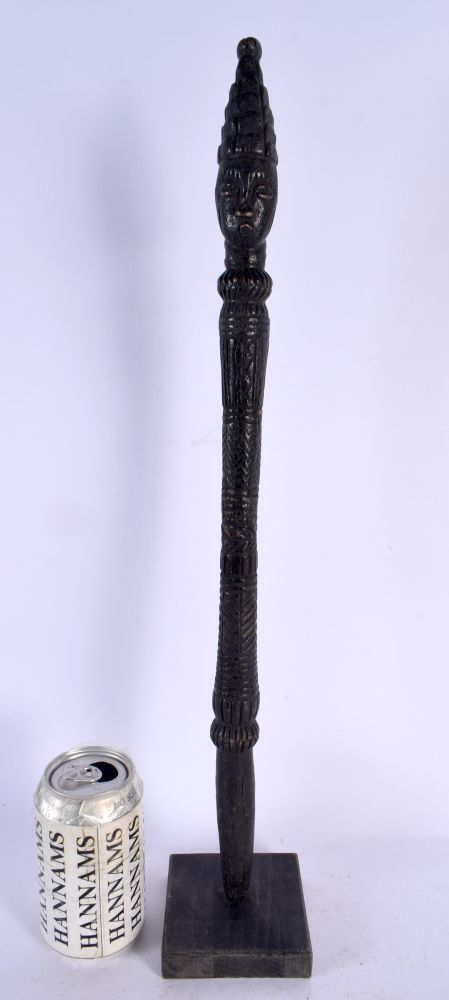 A LARGE 19TH CENTURY CONTINENTAL CARVED TRIBAL CHIEFS STAFF of figural form. 51 cm high.