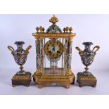 A GOOD 19TH CENTURY FRENCH CHAMPLEVE ENAMEL BRONZE CLOCK GARNITURE with foliate decoration. Mantel 3