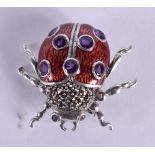 A SILVER AND ENAMEL LADY BIRD BROOCH. 8 grams. 3 cm x 3.5 cm.