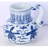 A Chinese porcelain blue and white jug decorated with foliage 15 cm.