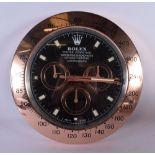 A ROLEX SHOP DISPLAY ADVERTISING WALL CLOCK. 33 cm diameter.