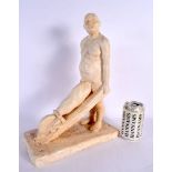A LARGE AND UNUSUAL STUDIO POTTERY FIGURE OF A MALE modelled nude, with an wonderfully oversized pha