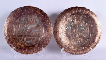 A PAIR OF 19TH CENTURY MIDDLE EASTERN EGYPTIAN STYLE SILVER INLAID DISHES decorated with figures. 22