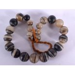 A 19TH CENTURY CONTINENTAL BANDED AGATE NECKLACE. 52 cm long.