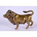 AN 18TH/19TH CENTURY BRONZE FIGURE OF A BULL. 5 cm x 3.25 cm.