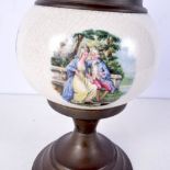 A metal and porcelain converted oil lamp with decorated with figures in panels 55 x 20 cm.
