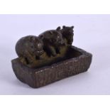 A JAPANESE BRONZE PIG TROUGH. 4.5 cm x 2 cm.