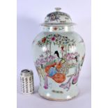 A LARGE LATE 19TH CENTURY CHINESE FAMILLE ROSE PORCELAIN VASE AND COVER painted with a figure on a c