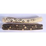 TWO RARE 18TH CENTURY JAPANESE EDO PERIOD CARVED STAG ANTLER PIPE HOLDERS. 19 cm long. (2)