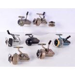 A collection of vintage J W Young Ambidex fixed spool fishing reels together with an Allcocks reel (