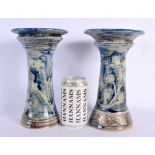 A PAIR OF SALT GLAZED STUDIO POTTERY PEDESTAL COMPORTS decorated in the manner of Doulton Lambeth. 2