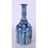 A MIDDLE EASTERN FAIENCE PEDESTAL VASE. 21 cm high.