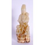 A CHINESE CARVED GREEN JADE FIGURE OF A STANDING DEITY 20th Century. 15 cm x 5 cm.