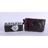 A LEATHER CASED EUROPEAN CAMERA No 10299. 13.5 cm wide.