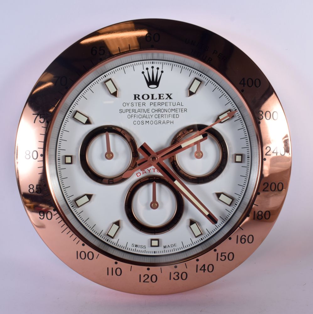 A ROLEX SHOP DISPLAY ADVERTISING WALL CLOCK. 33 cm diameter.