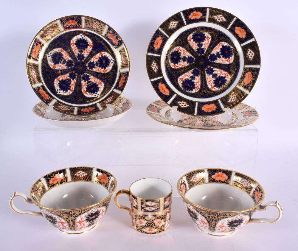 Early 20th century Royal Crown Derby pattern 1128, two cups, saucers and side plates. Plates 16cm d