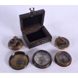 THREE CONTEMPORARY COMPASS. Largest 7.5 cm wide. (3)