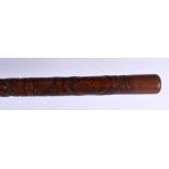 A RARE AFRICAN TRIBAL CARVED WOOD TRIBAL STAFF. 81 cm long.