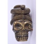 A BRASS SKULL AND SNAKE VESTA CASE. 65 grams. 5.25 cm x 3.75 cm.