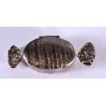 A CONTINENTAL SILVER PILL BOX IN THE FORM OF A WRAPPED SWEETIE. Stamped 925, 1.5cm x 5.8cm x 2.4cm,