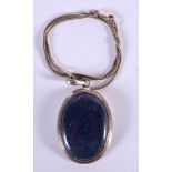 A SILVER AND LAPIS LAZULI NECKLACE. 23 grams. Chain 18 cm long, pendant 5 cm x 3 cm.