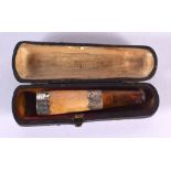 AN ANTIQUE SILVER MOUNTED AMBER CHEROOT HOLDER. 8.8 grams. Birmingham 1903. 6.75 cm x 1.5 cm.