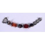 A VINTAGE CONTINENTAL SILVER AND AGATE BRACELET. 30 grams. 20 cm x 3 cm.