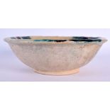 A RARE 12TH CENTURY SPLASHED SAMARRA POTTERY BOWL - CENTRAL ASIA the bowl with green and iron splas