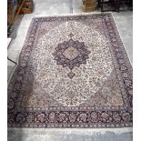 A large Persian rug 383 x 268 cm .