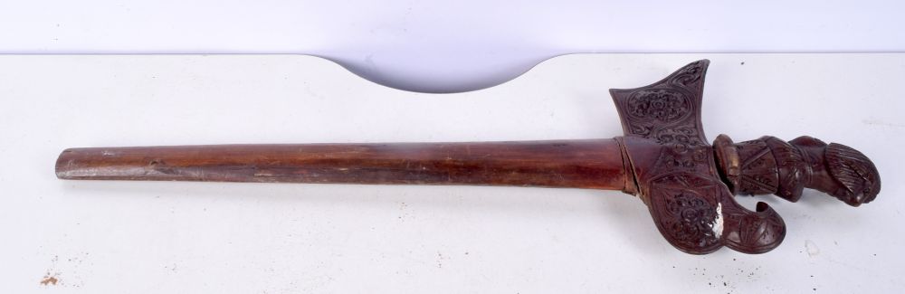 A Balinese carved wood Kris knife 52 cm