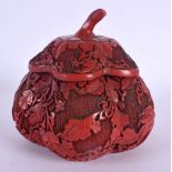 A CHINESE CARVED RED LACQUER MELON FORM BOX AND COVER 20th Century. 11 cm x 13 cm.